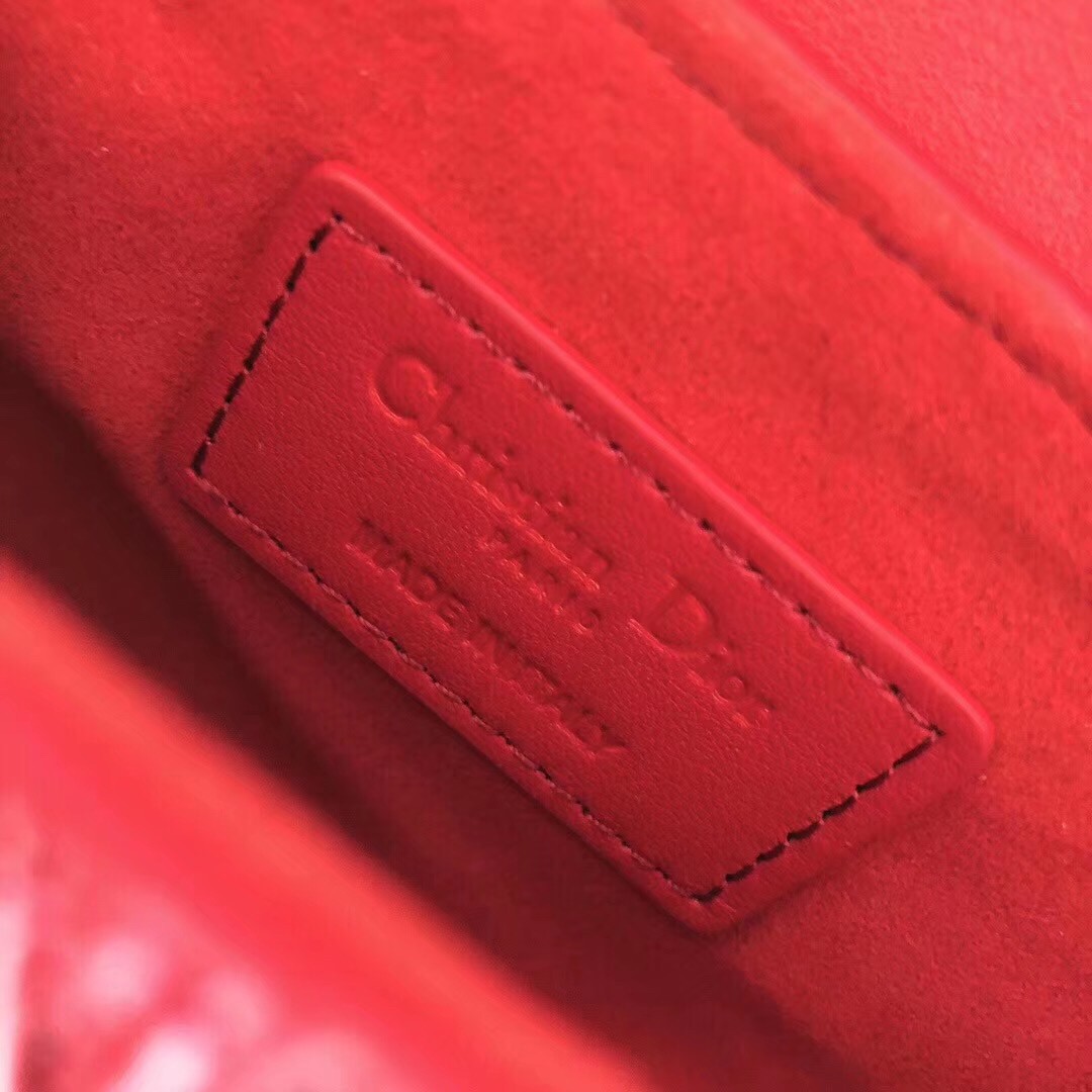 D*or saddle bag in red braided leather strips with fringe