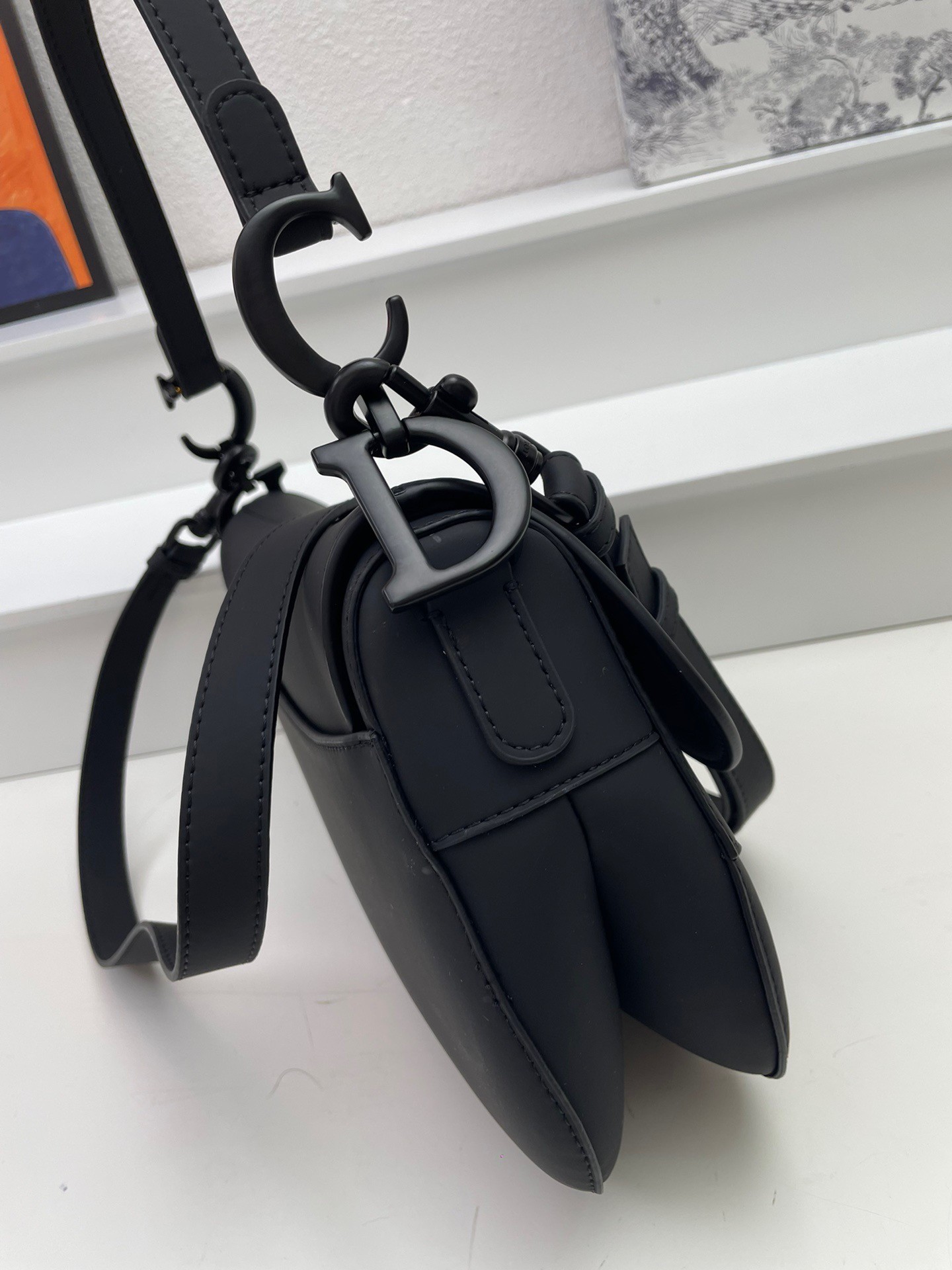 D*or saddle bag with strap in black ultramatte calfskin