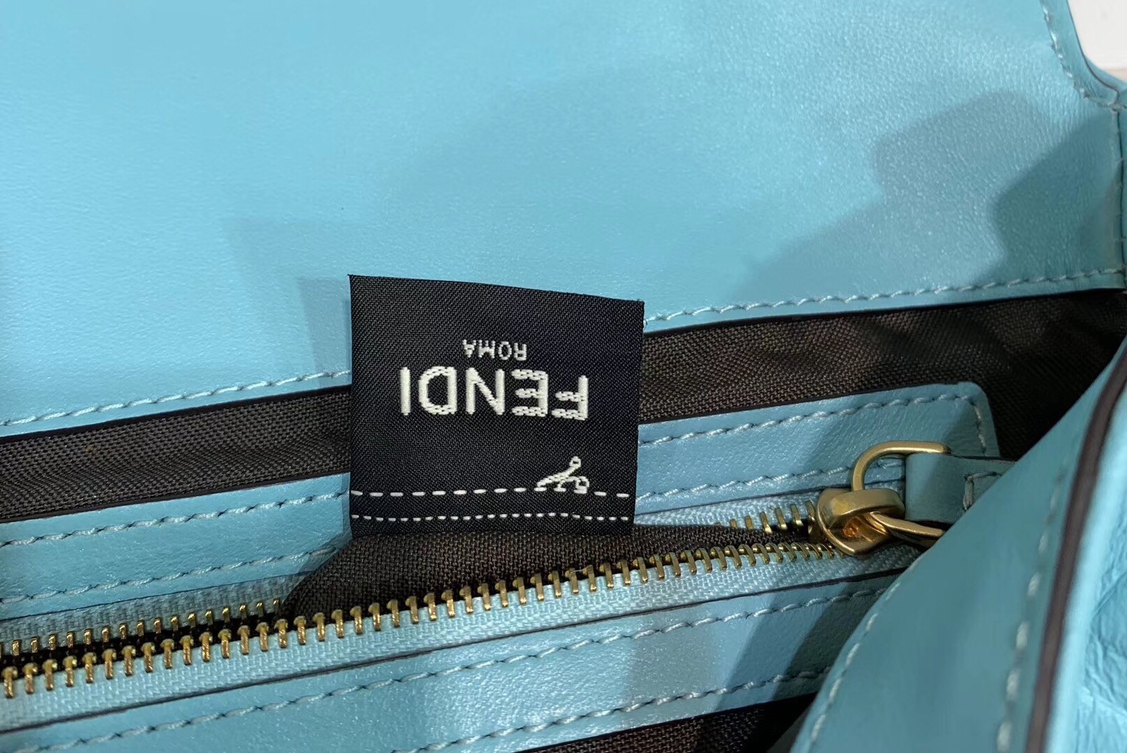 F**di pale blue ff motif large baguette bag
