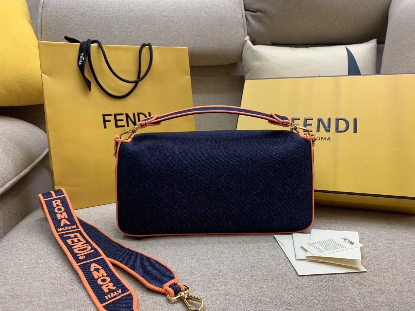 f**di large baguette bag in blue De*1m with orange trim
