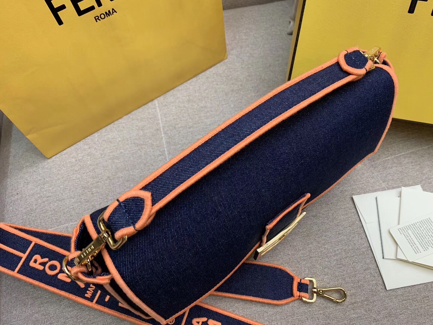 f**di large baguette bag in blue De*1m with orange trim