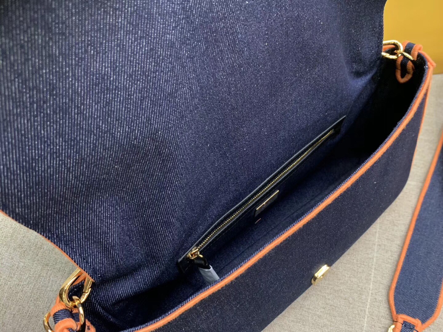 f**di large baguette bag in blue De*1m with orange trim