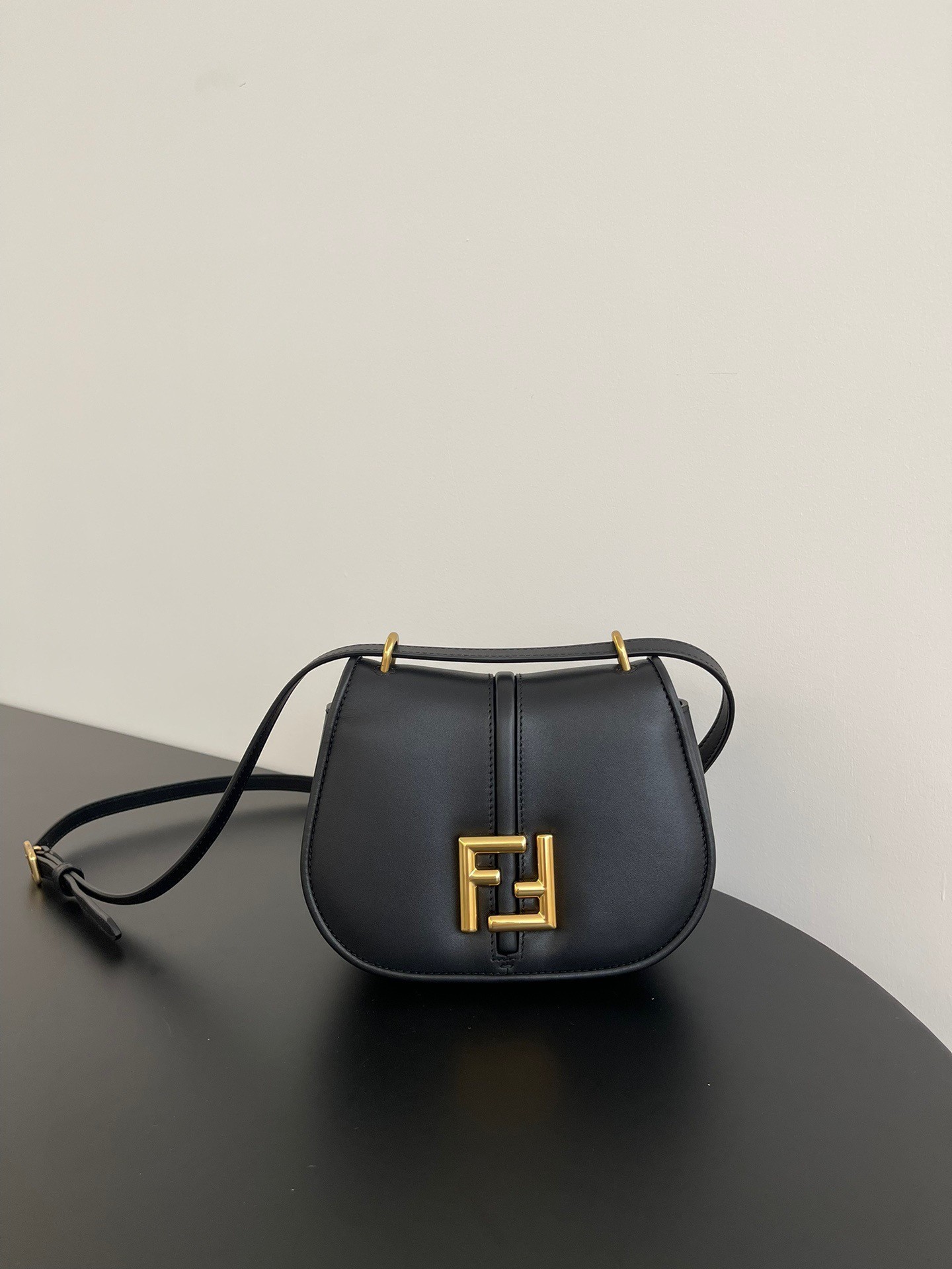 F**di c’mon small bag in black calfskin