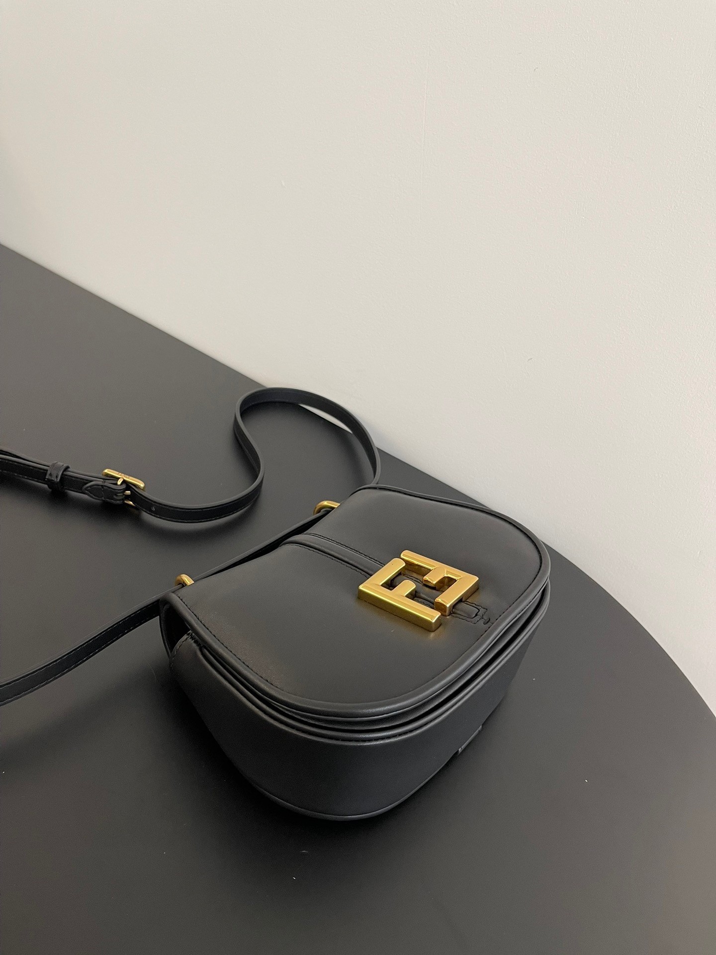 F**di c’mon small bag in black calfskin