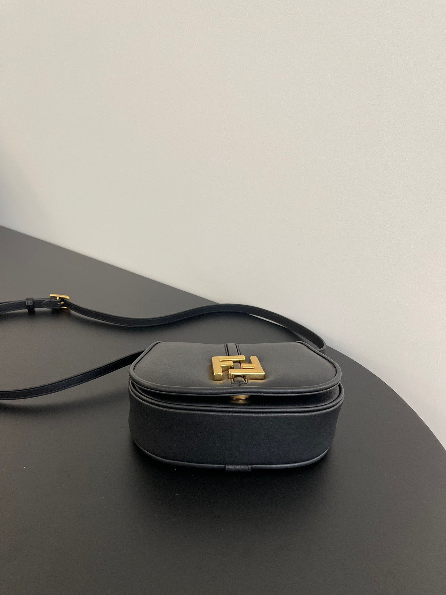 F**di c’mon small bag in black calfskin