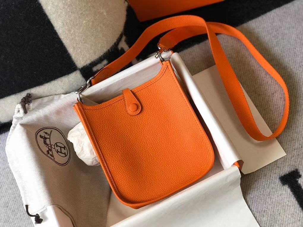 H**mes evelyne iii tpm mini bag in orange clemence leather