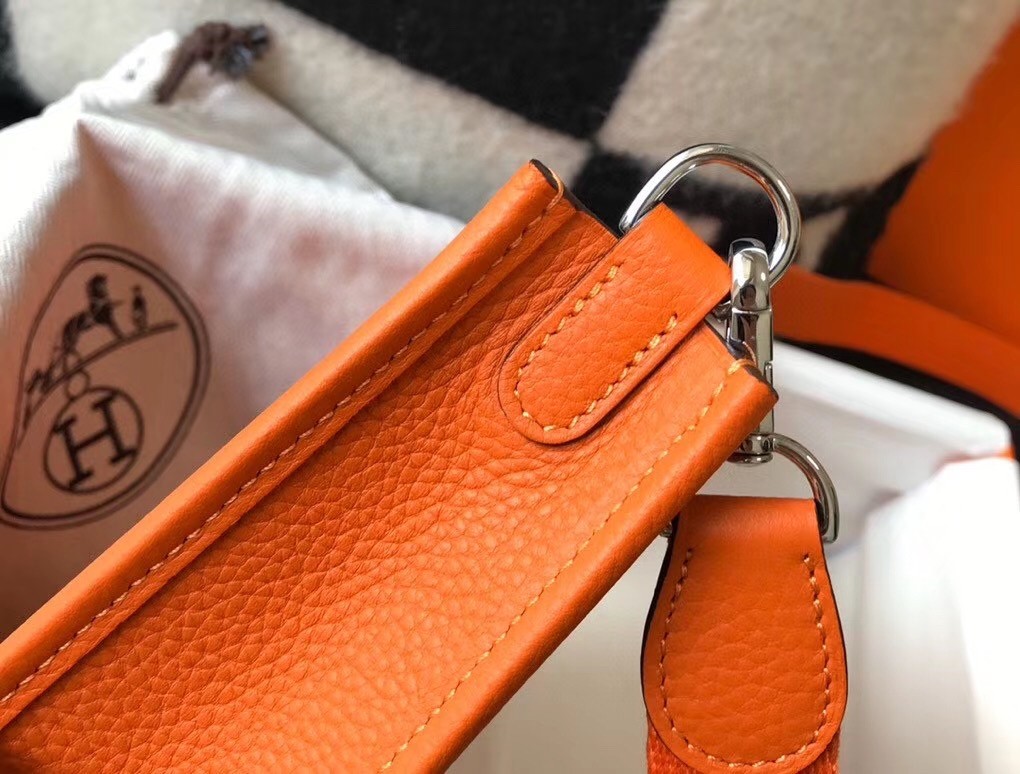 H**mes evelyne iii tpm mini bag in orange clemence leather