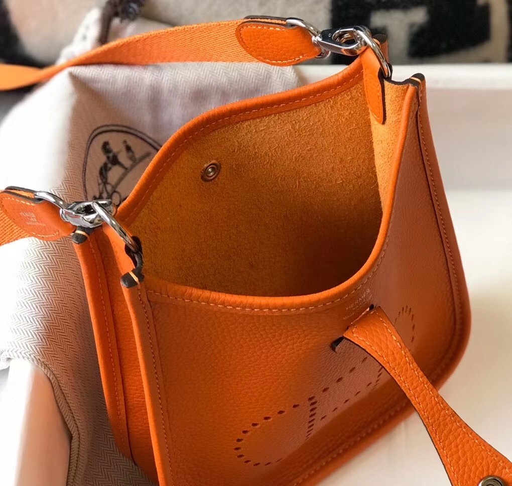 H**mes evelyne iii tpm mini bag in orange clemence leather