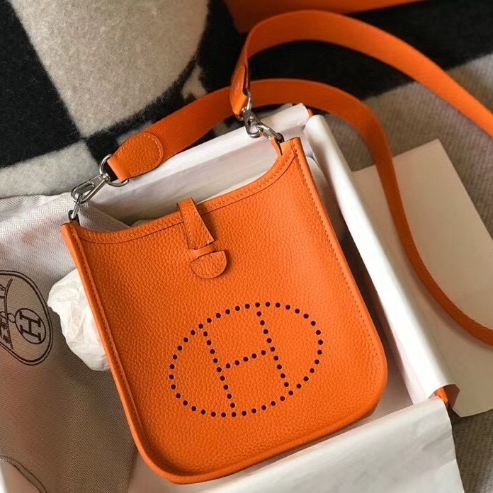 H**mes evelyne iii tpm mini bag in orange clemence leather