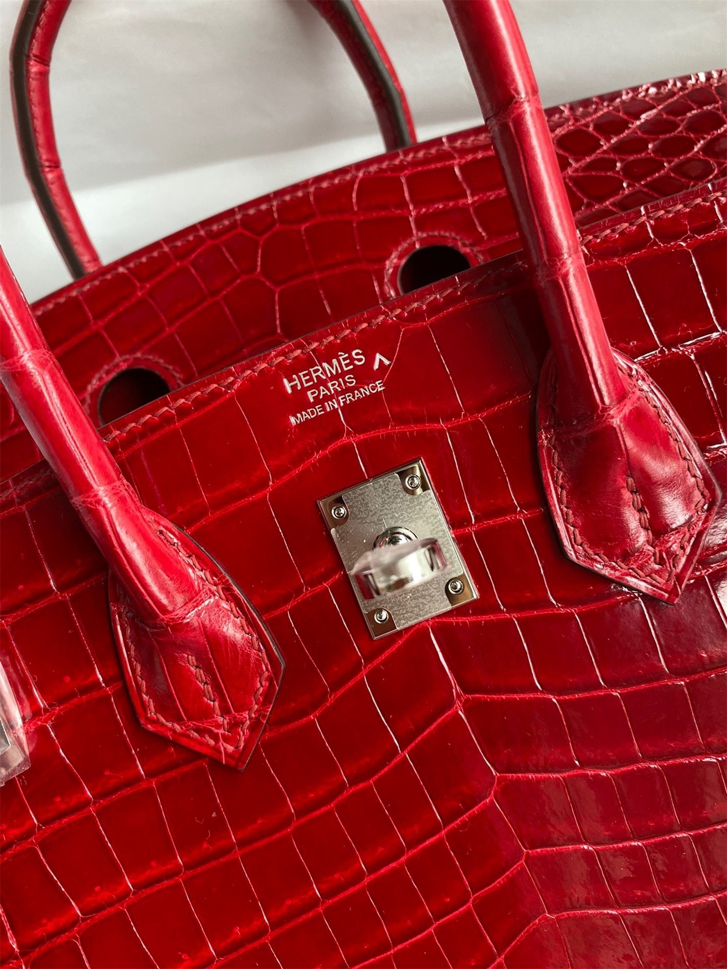 H**mes birkin 25 handmade bag in red crocodile porosus shiny skin