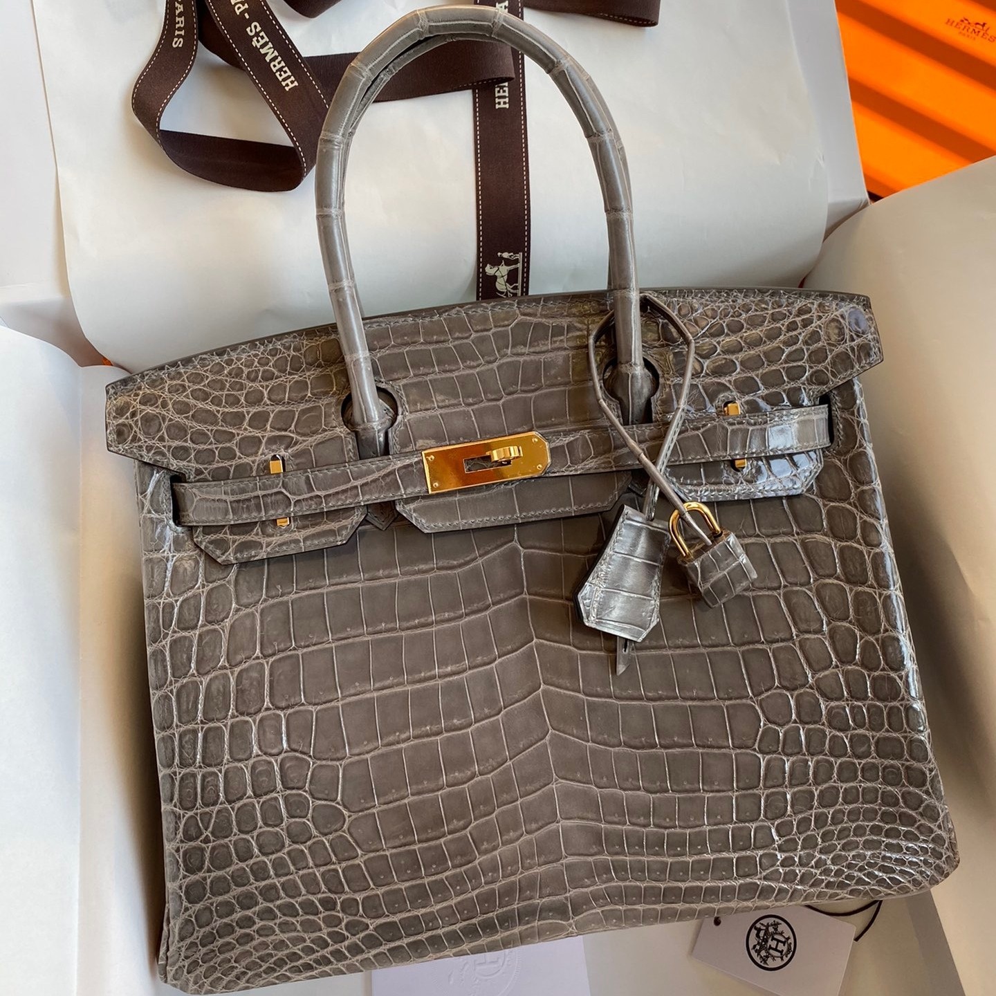 H**mes birkin 30 handmade bag in gris tourterelle crocodile niloticus shiny skin