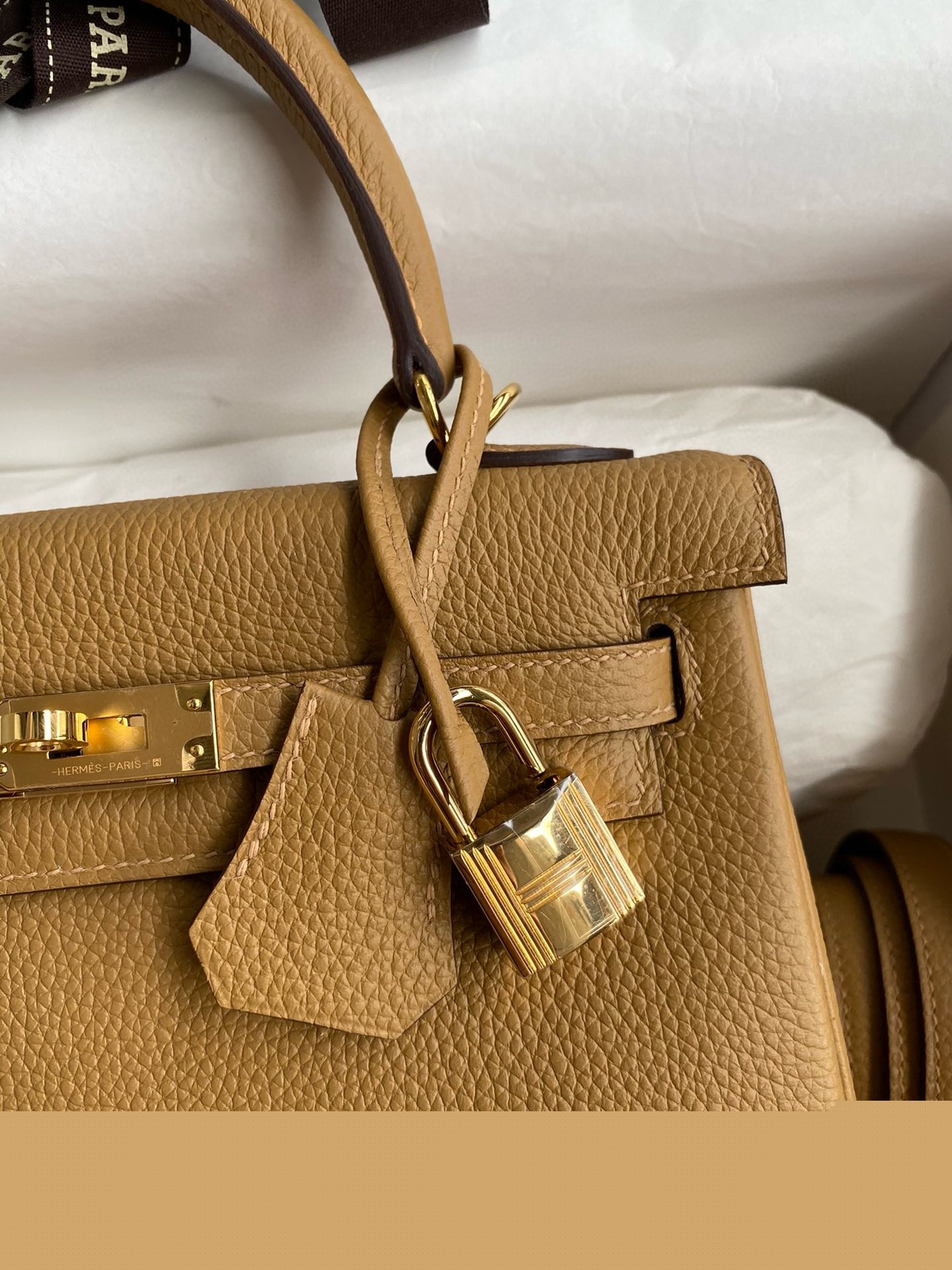 H**mes kelly retourne 25 handmade bag in biscuit clemence leather