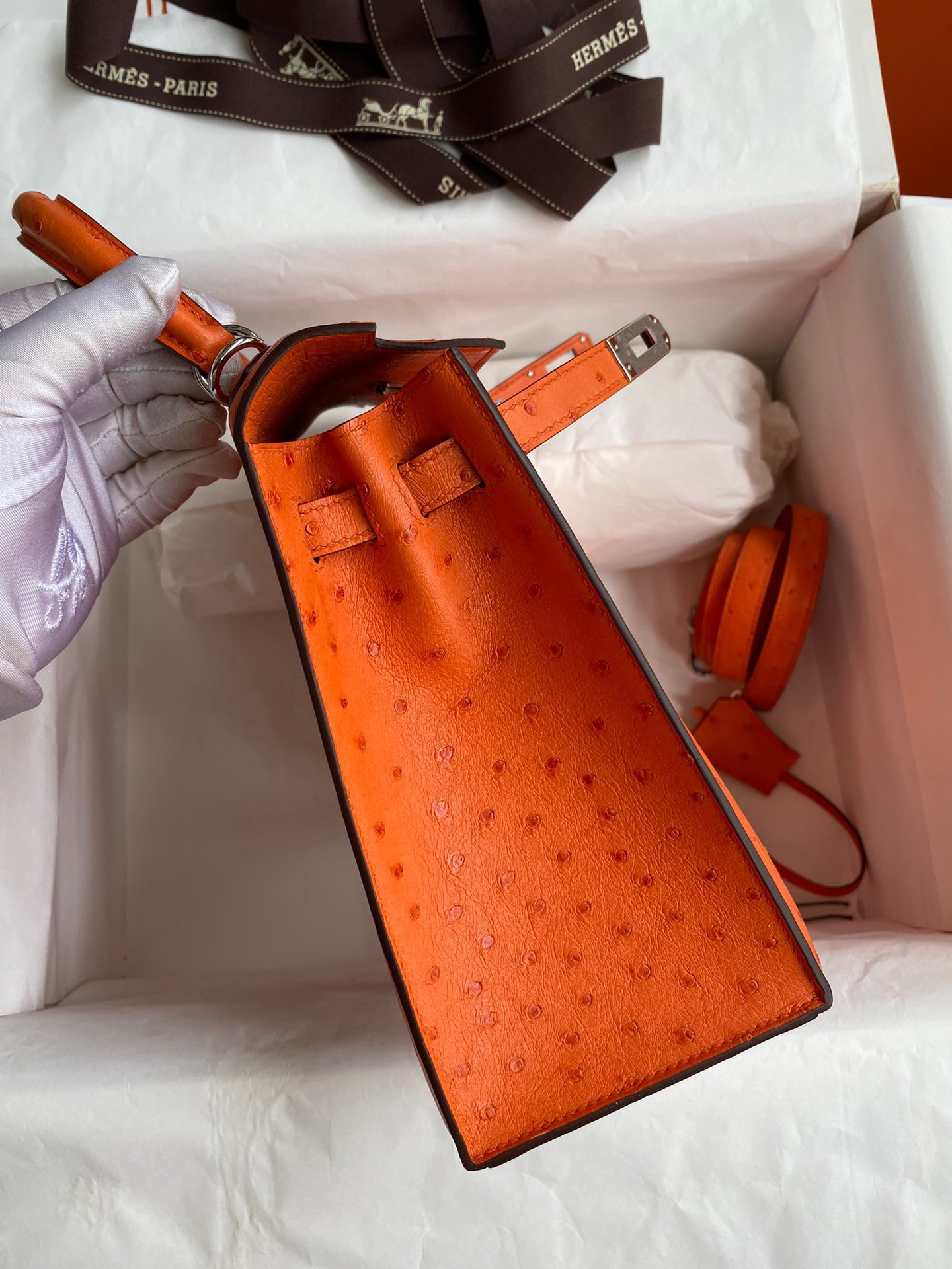 H**mes kelly sellier 25 handmade bag in orange ostrich leather