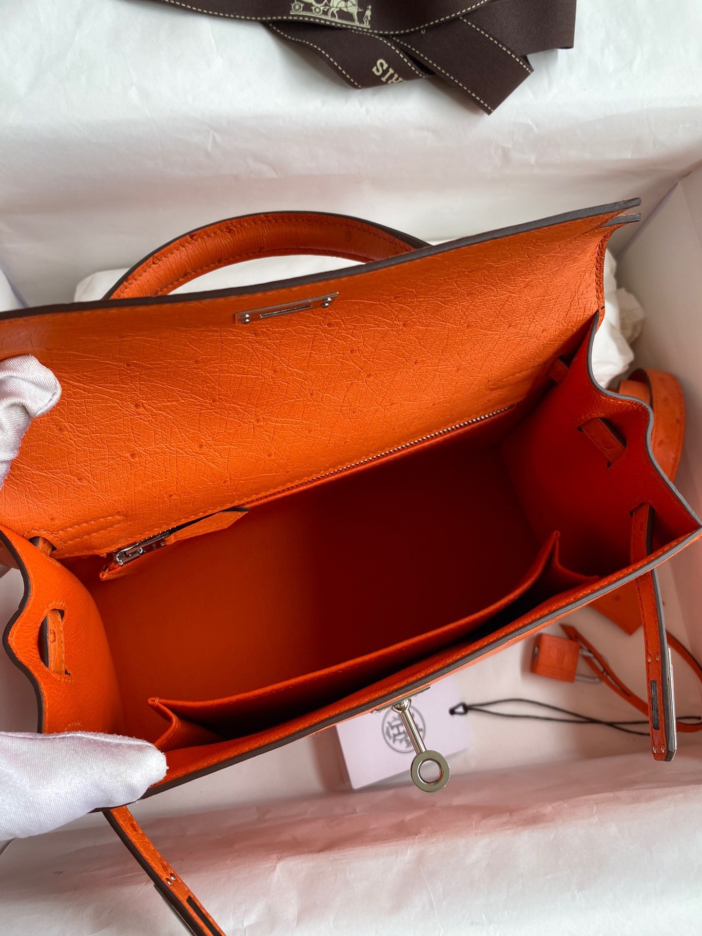H**mes kelly sellier 25 handmade bag in orange ostrich leather