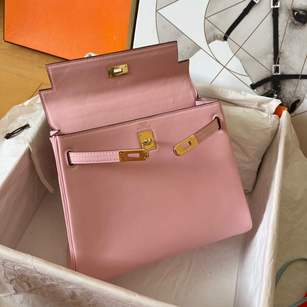 H**mes kelly retourne 25 handmade bag in pink swift calfskin