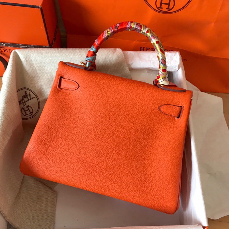 H**mes kelly retourne 28 handmade bag in orange clemence leather