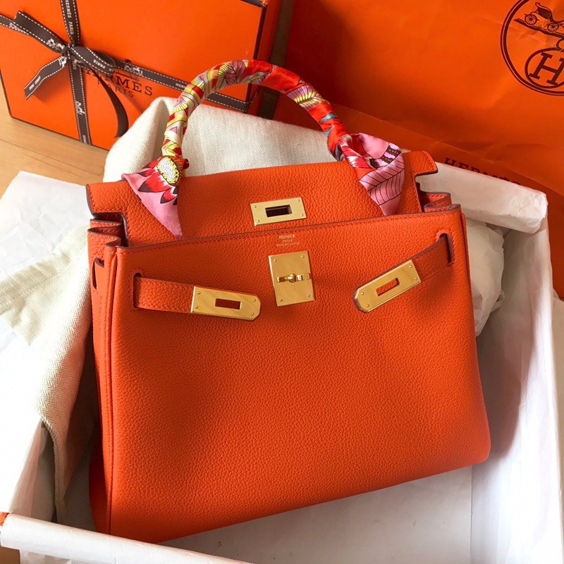 H**mes kelly retourne 28 handmade bag in orange clemence leather