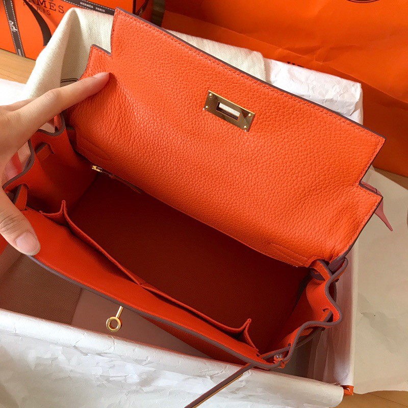 H**mes kelly retourne 28 handmade bag in orange clemence leather