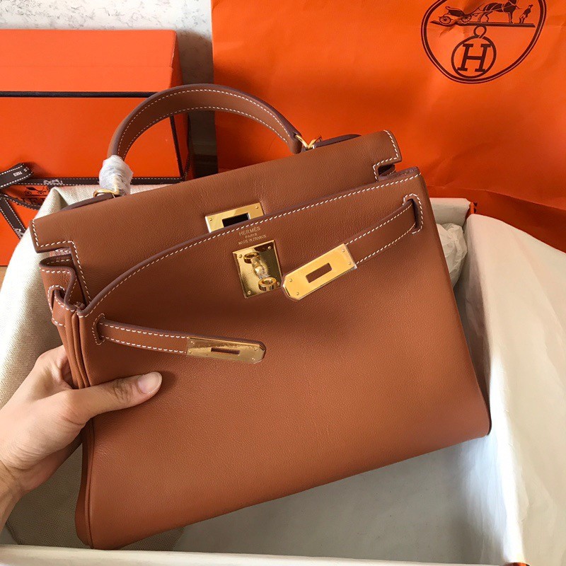 H**mes kelly retourne 28 handmade bag in gold swift calfskin