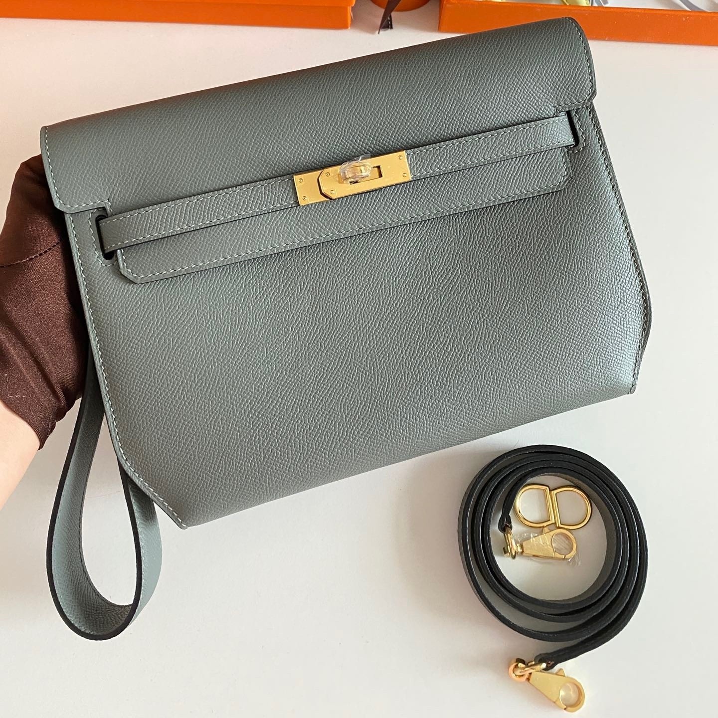 H**mes kelly depeches 25 pouch in vert amande epsom calfskin
