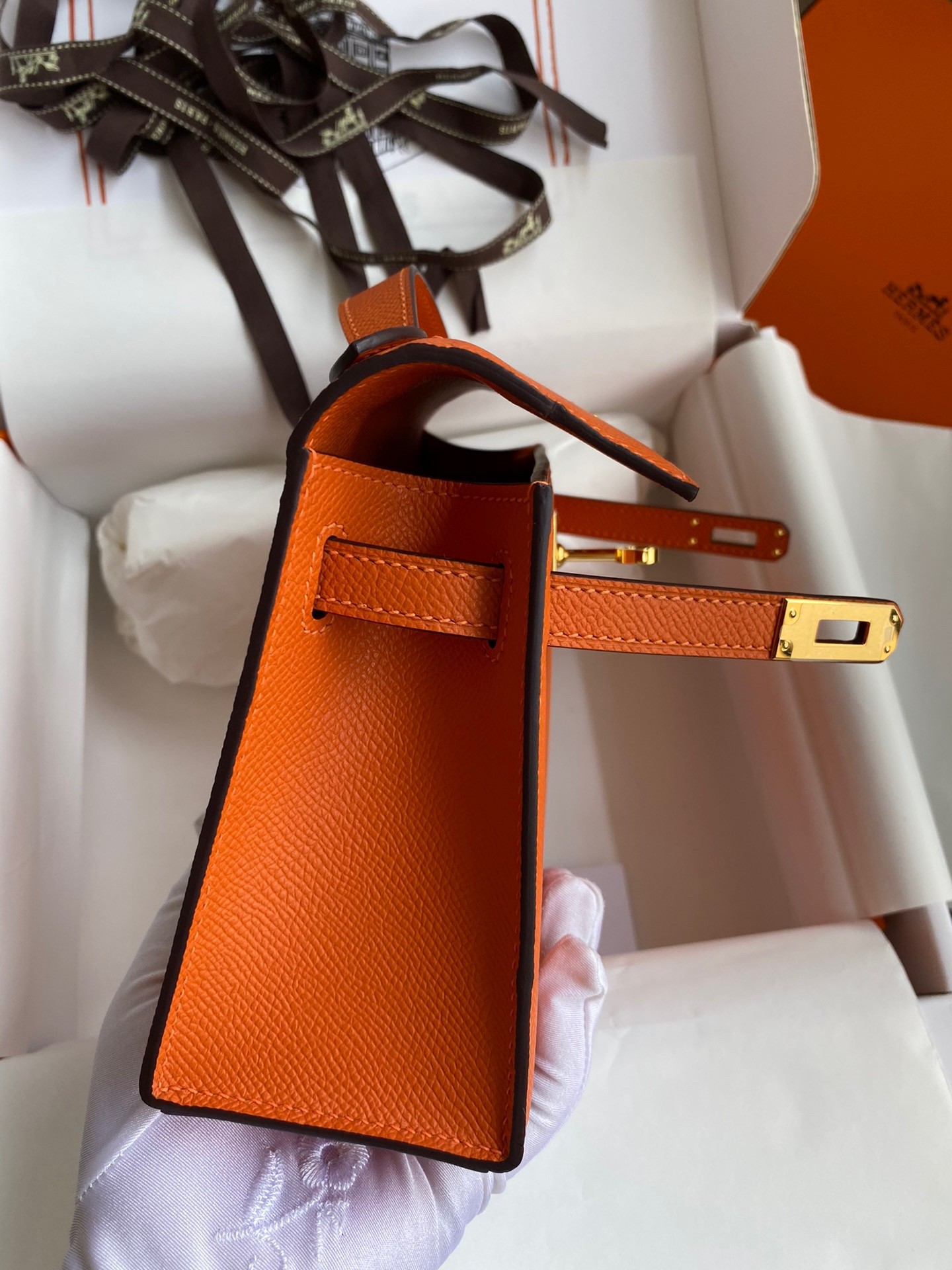H**mes kelly pochette handmade bag in orange epsom calfskin