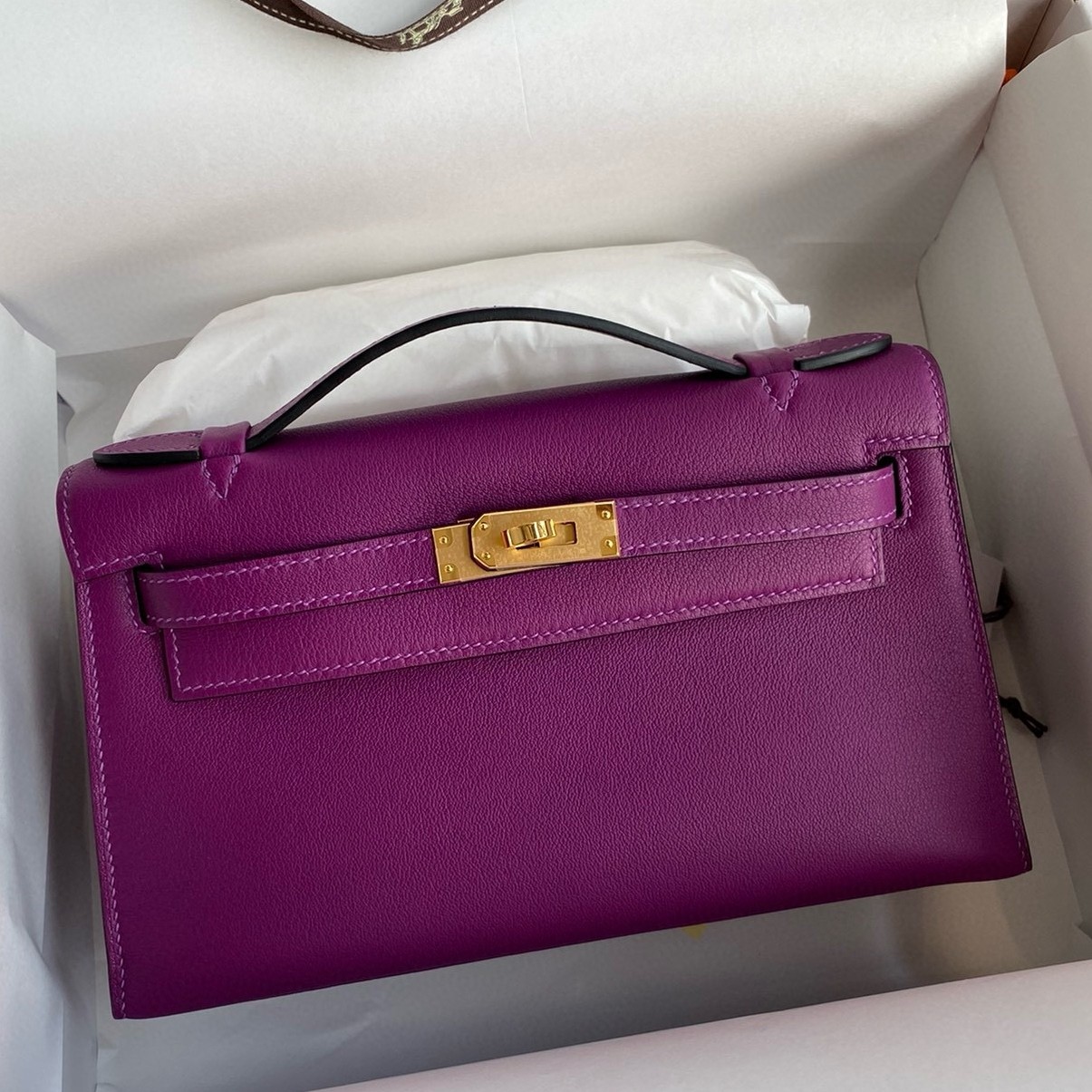 H**mes kelly pochette handmade bag in anemone swift calfskin