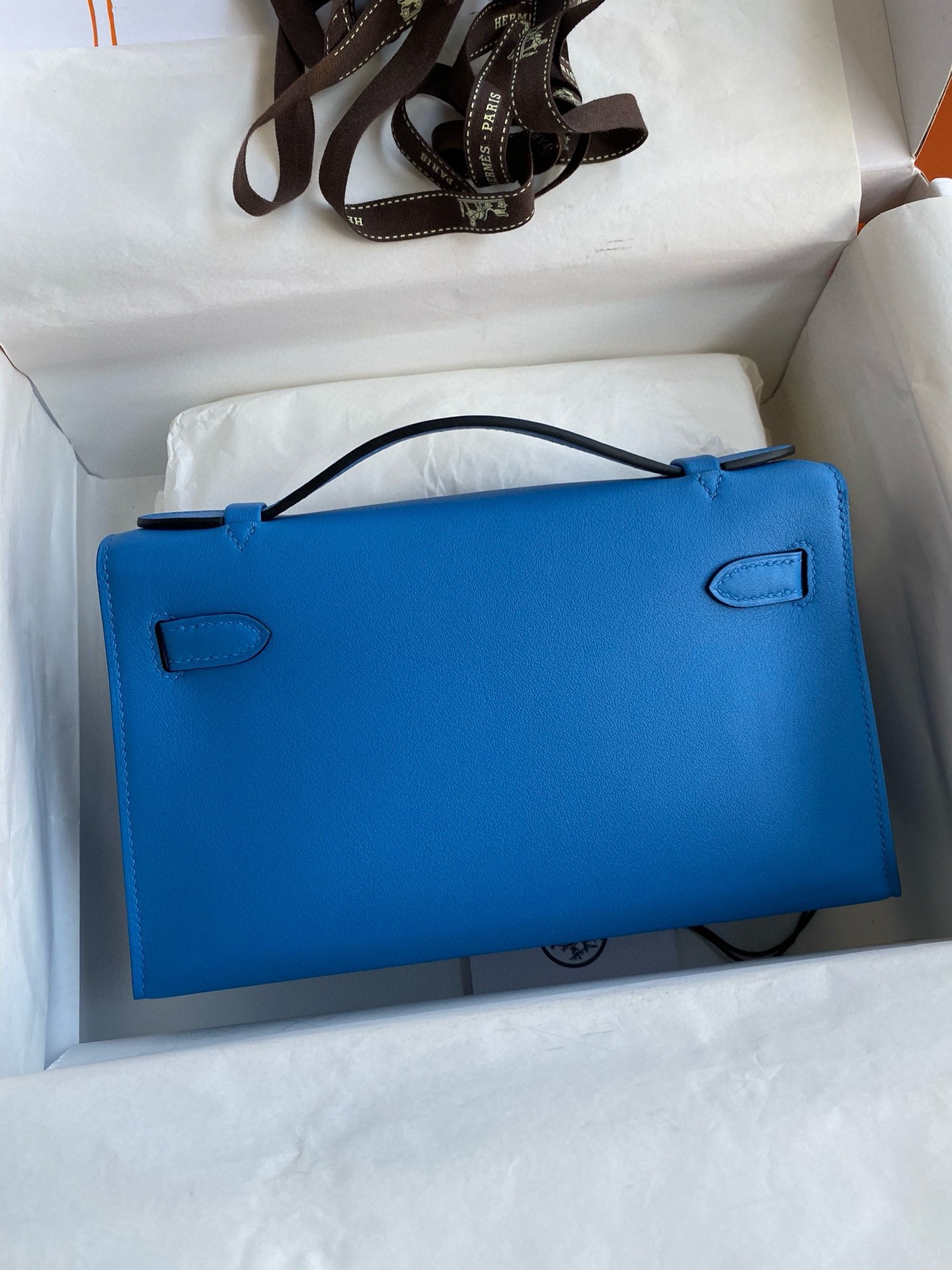 H**mes kelly pochette handmade bag in blue zanzibar swift calfskin