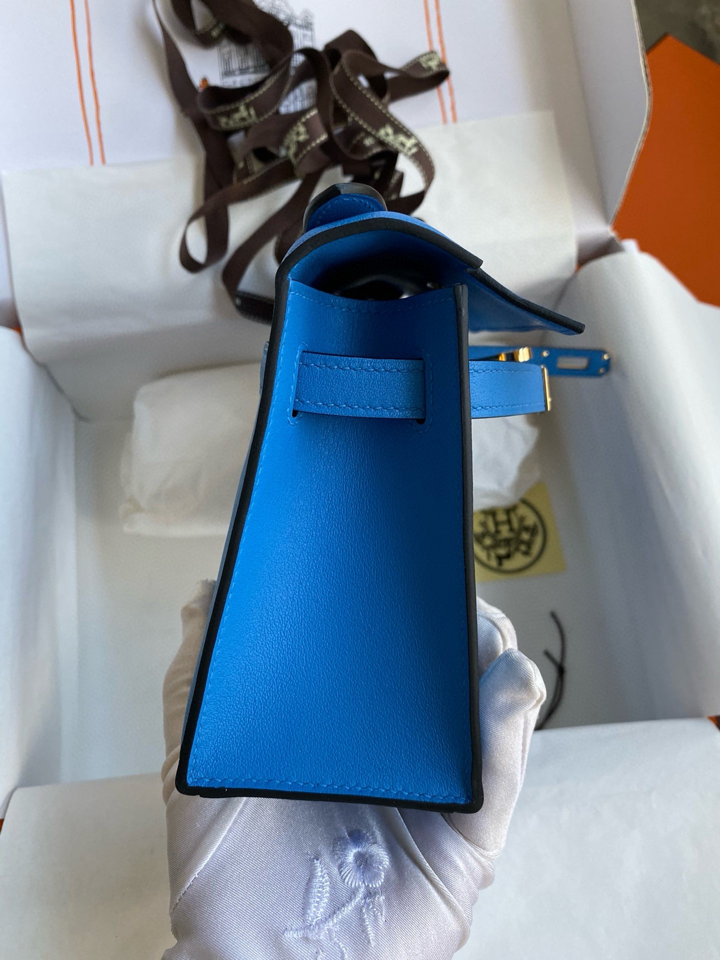 H**mes kelly pochette handmade bag in blue zanzibar swift calfskin
