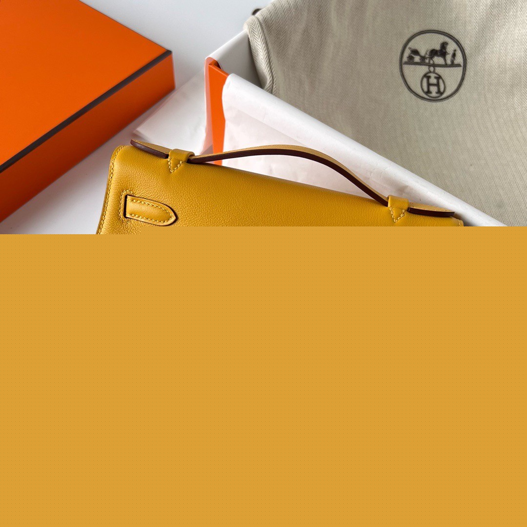 H**mes kelly pochette handmade bag in jaune ambre swift calfskin