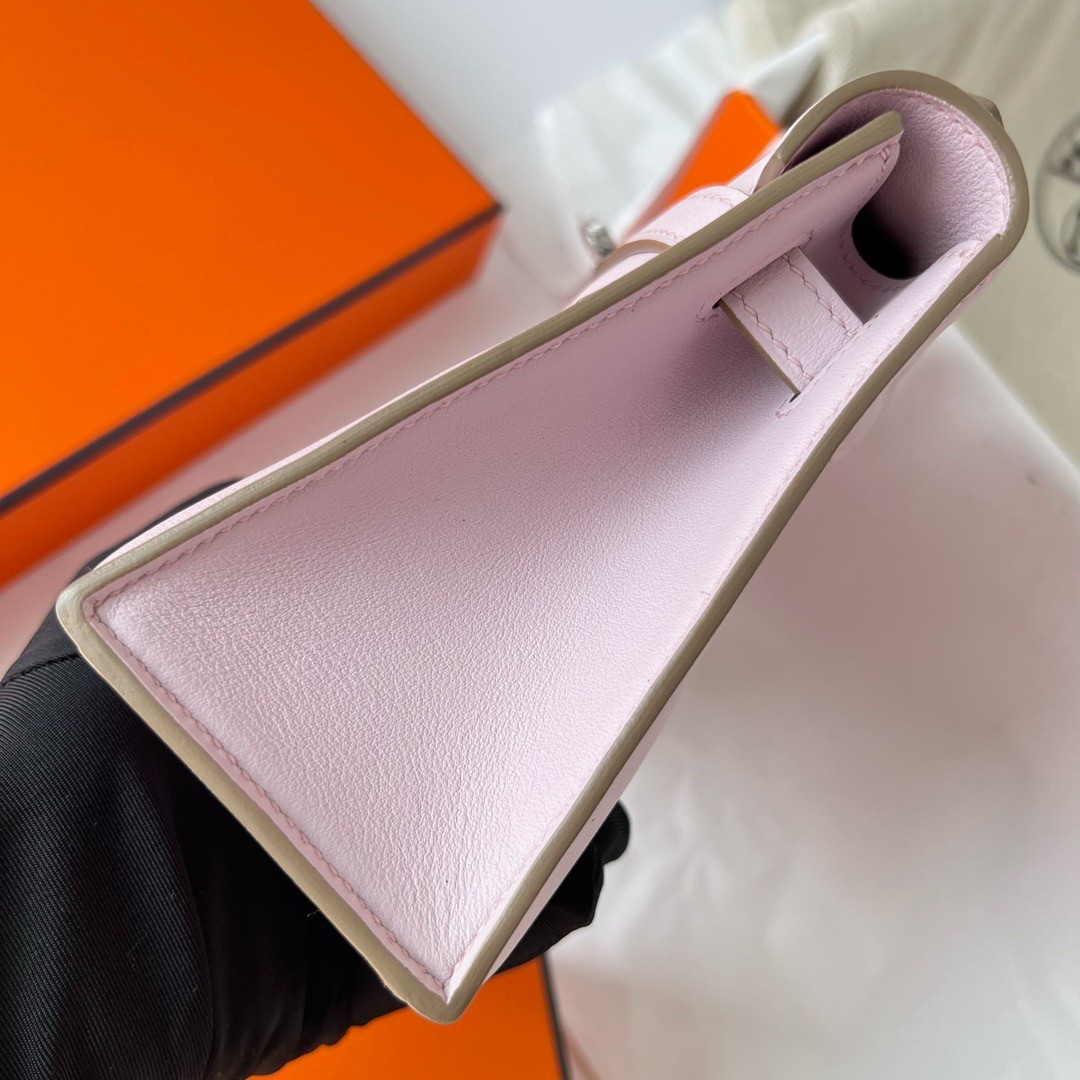 H**mes kelly pochette handmade bag in mauve pale swift calfskin
