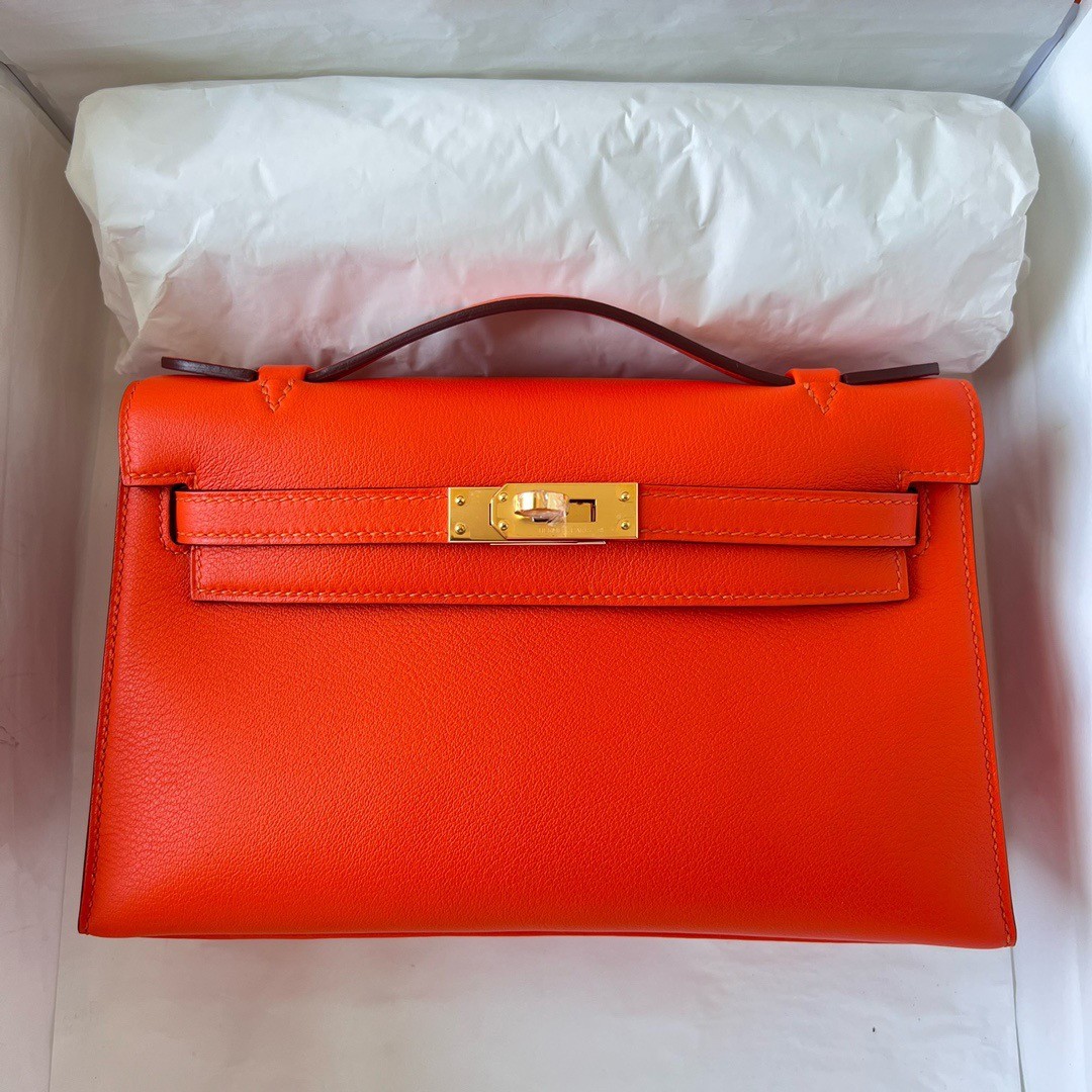 H**mes kelly pochette handmade bag in rouge piment swift calfskin