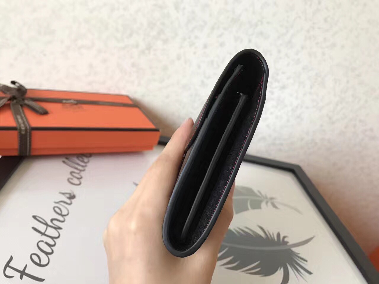H**mes black swift constance long wallet