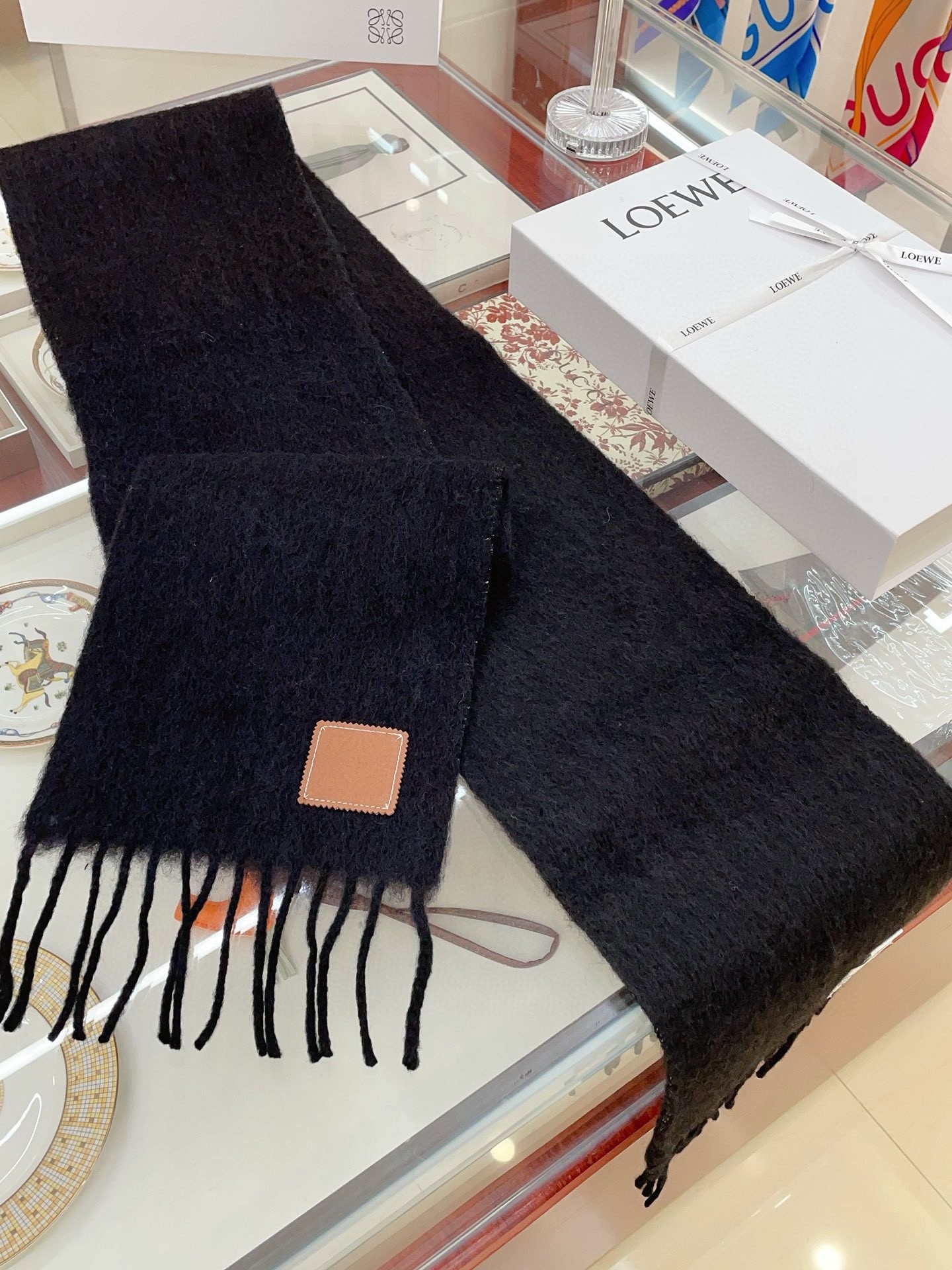 L0ew* scarf in black mohair and wool