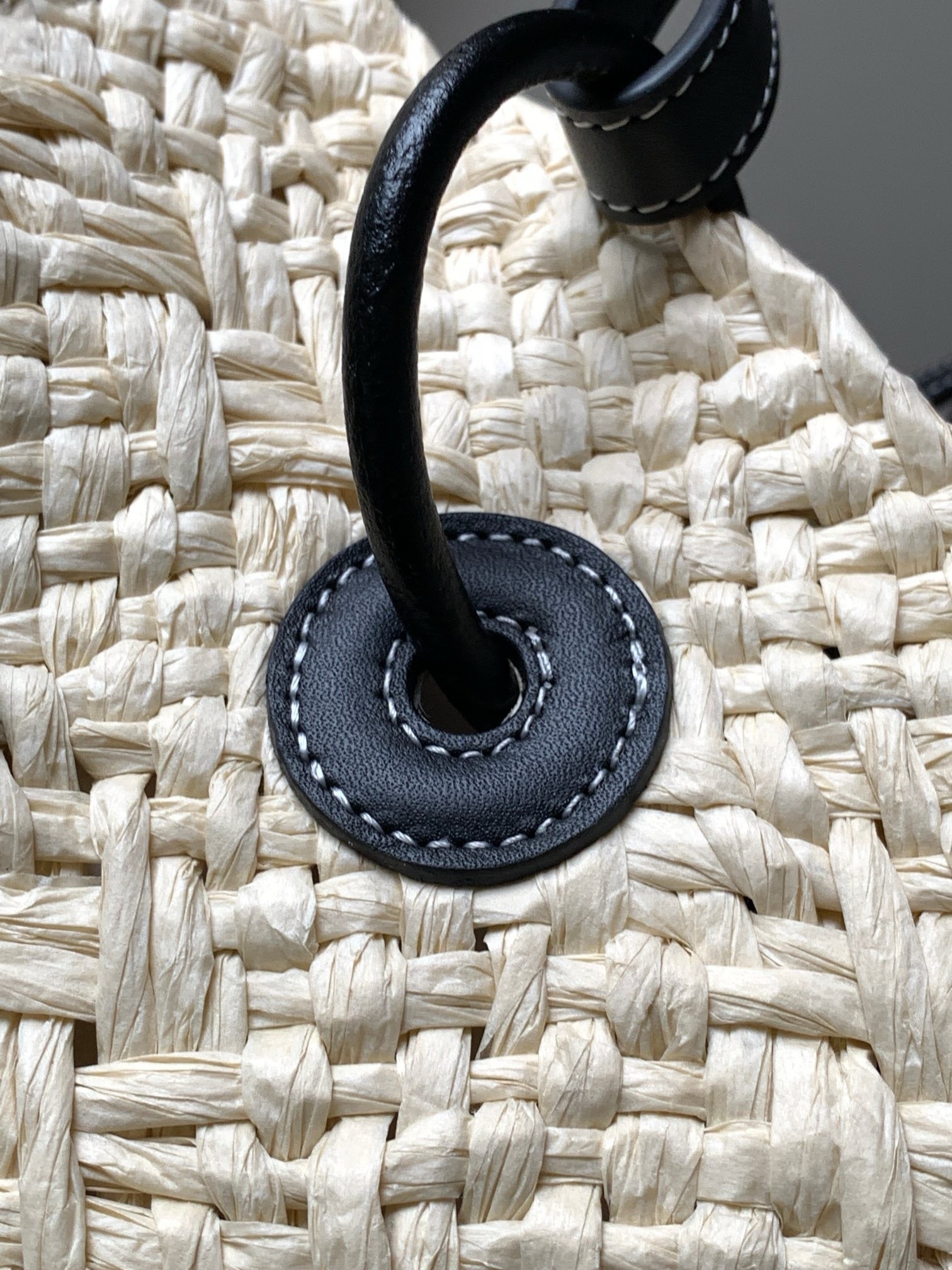 L0ew* medium anagram basket bag in iraca palm and black calfskin