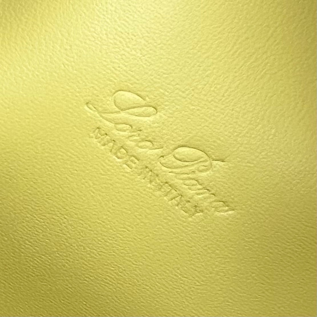 L**o p*ana extra pocket pouch l27 in yellow grained leather