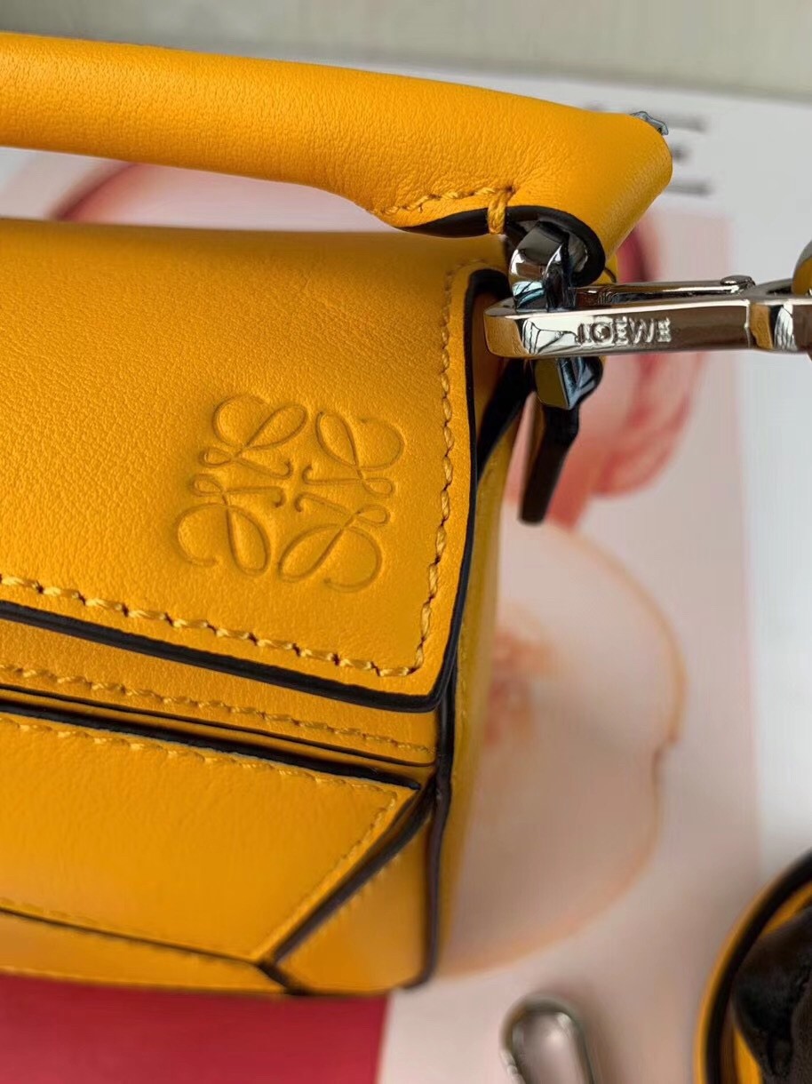 L0ew* puzzle mini bag in avocado green calfskin