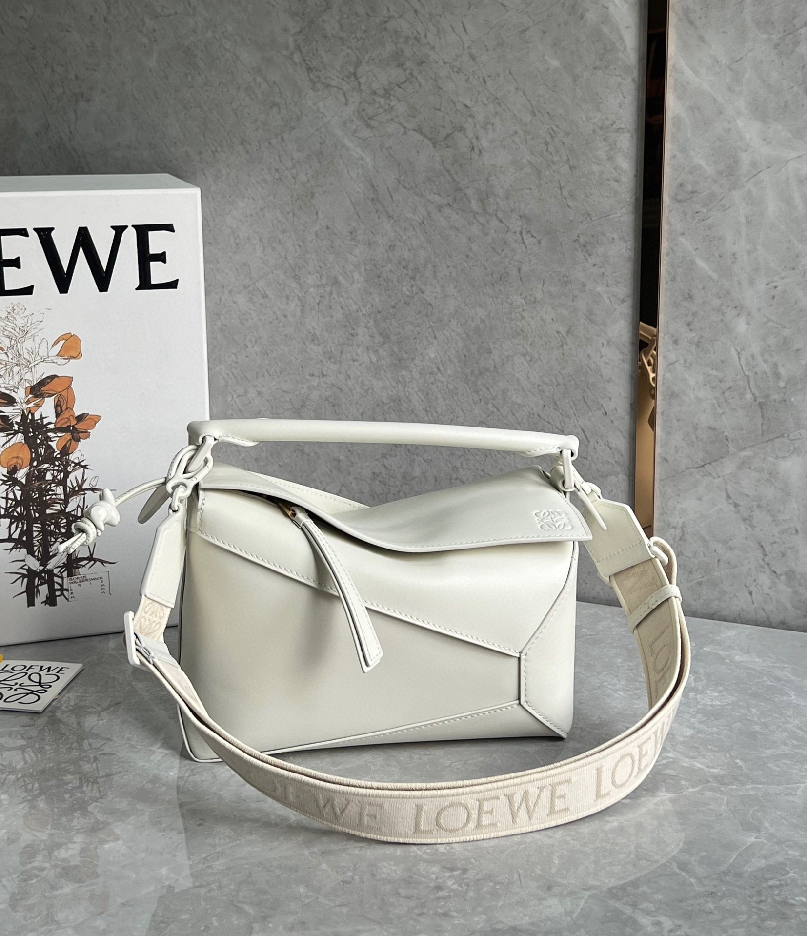L0ew* puzzle edge small bag in white satin calfskin