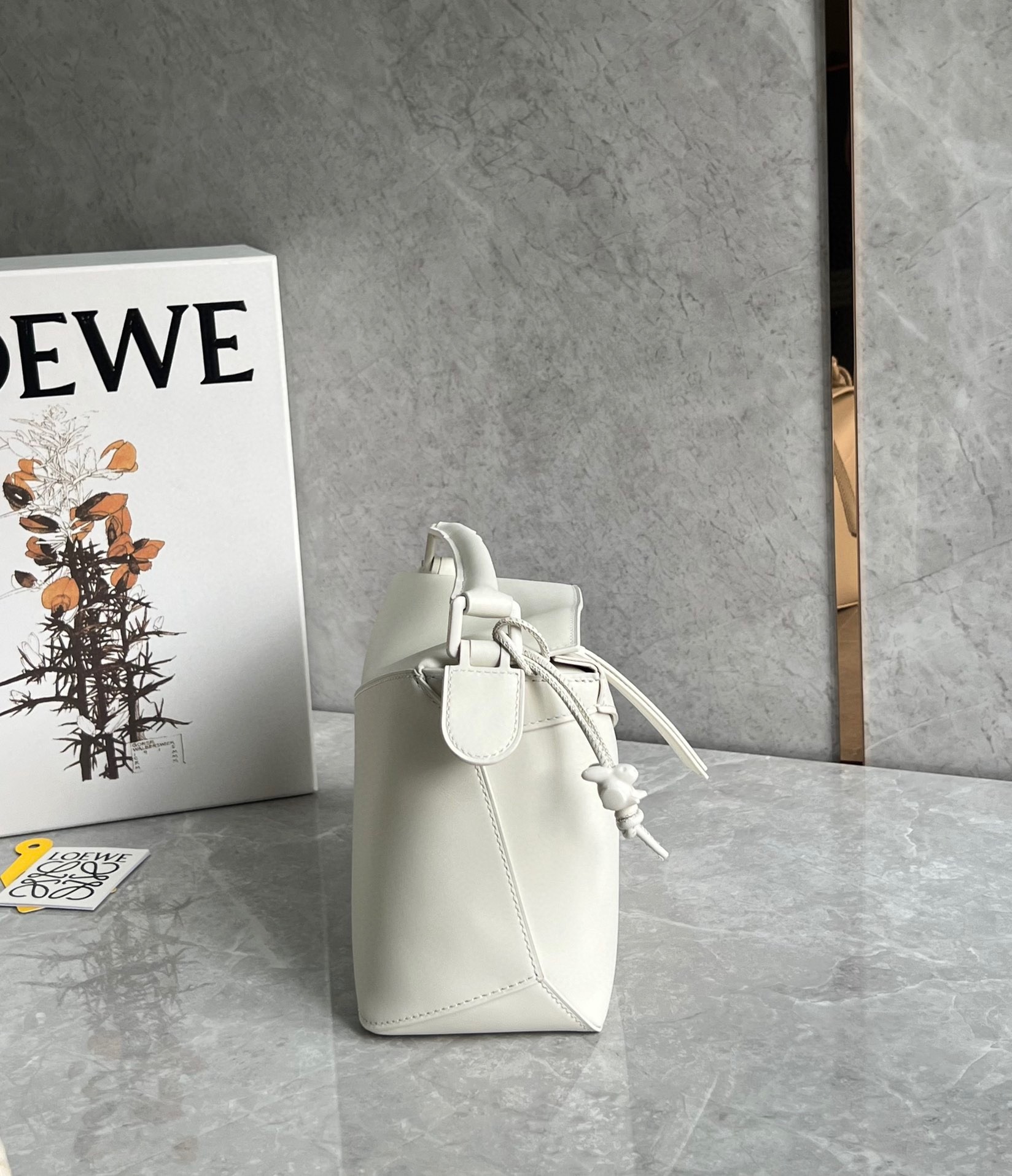 L0ew* puzzle edge small bag in white satin calfskin