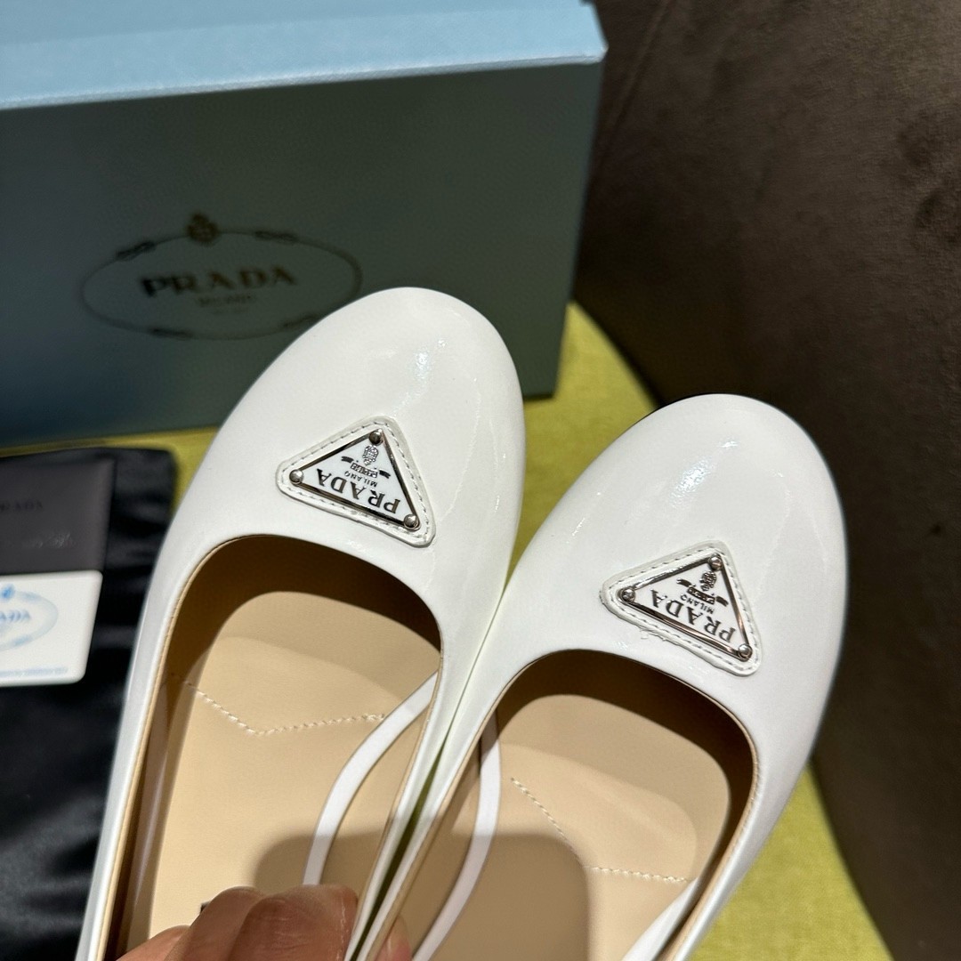 Pra*a ballerinas in white patent leather