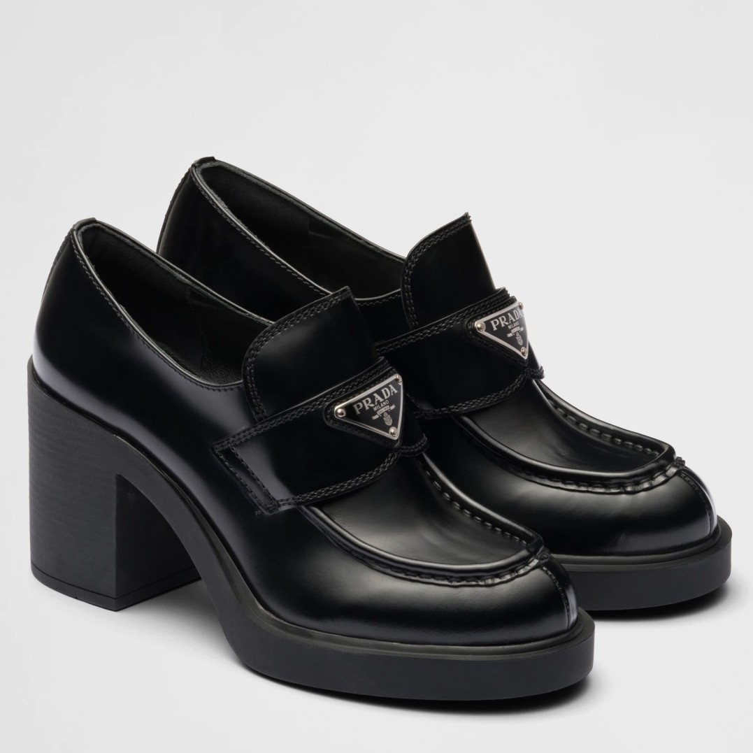 Pra*a chocolate high-heeled loafers in black brushed leather