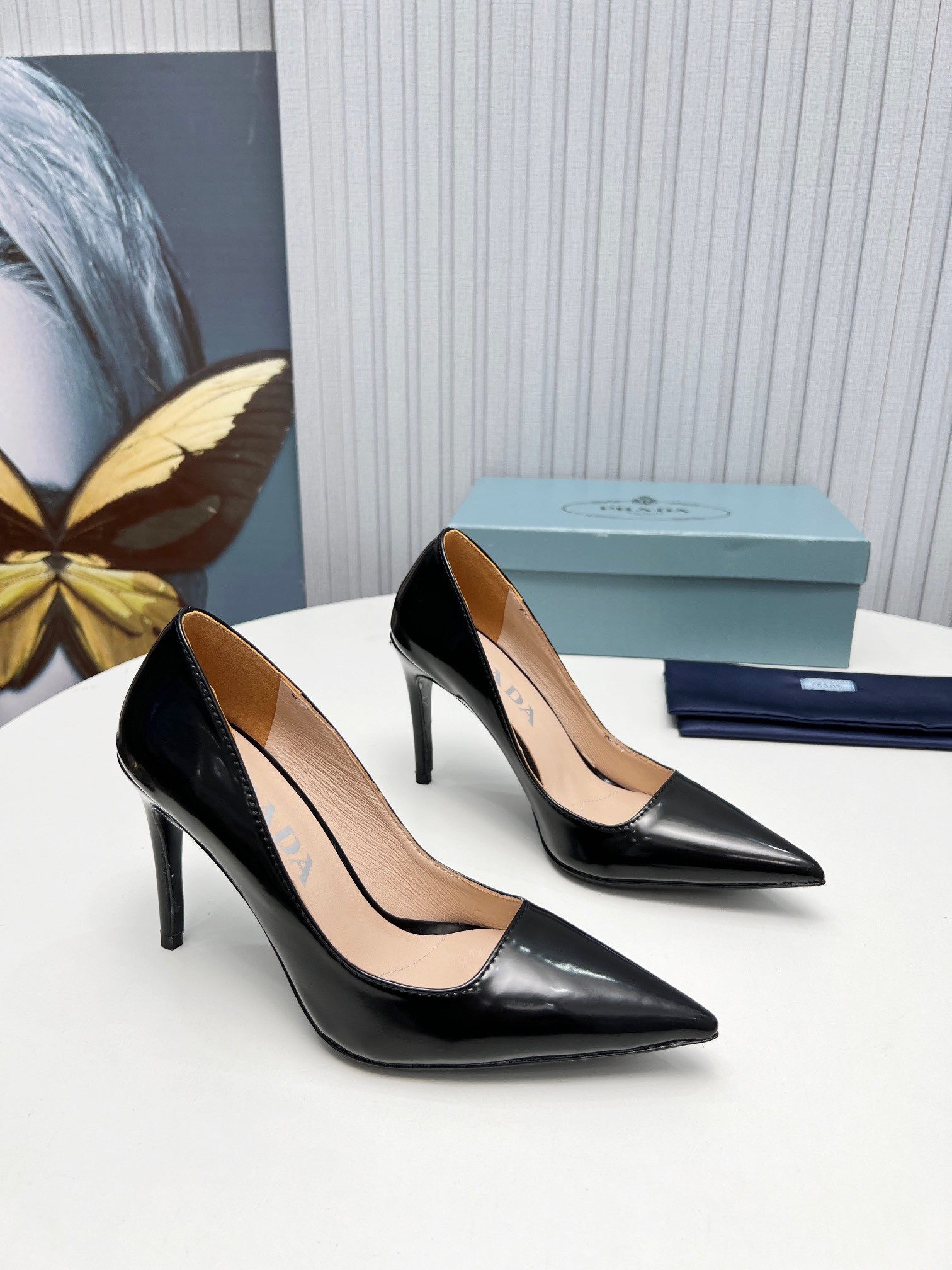Pra*a pumps 95mm in black patent leather