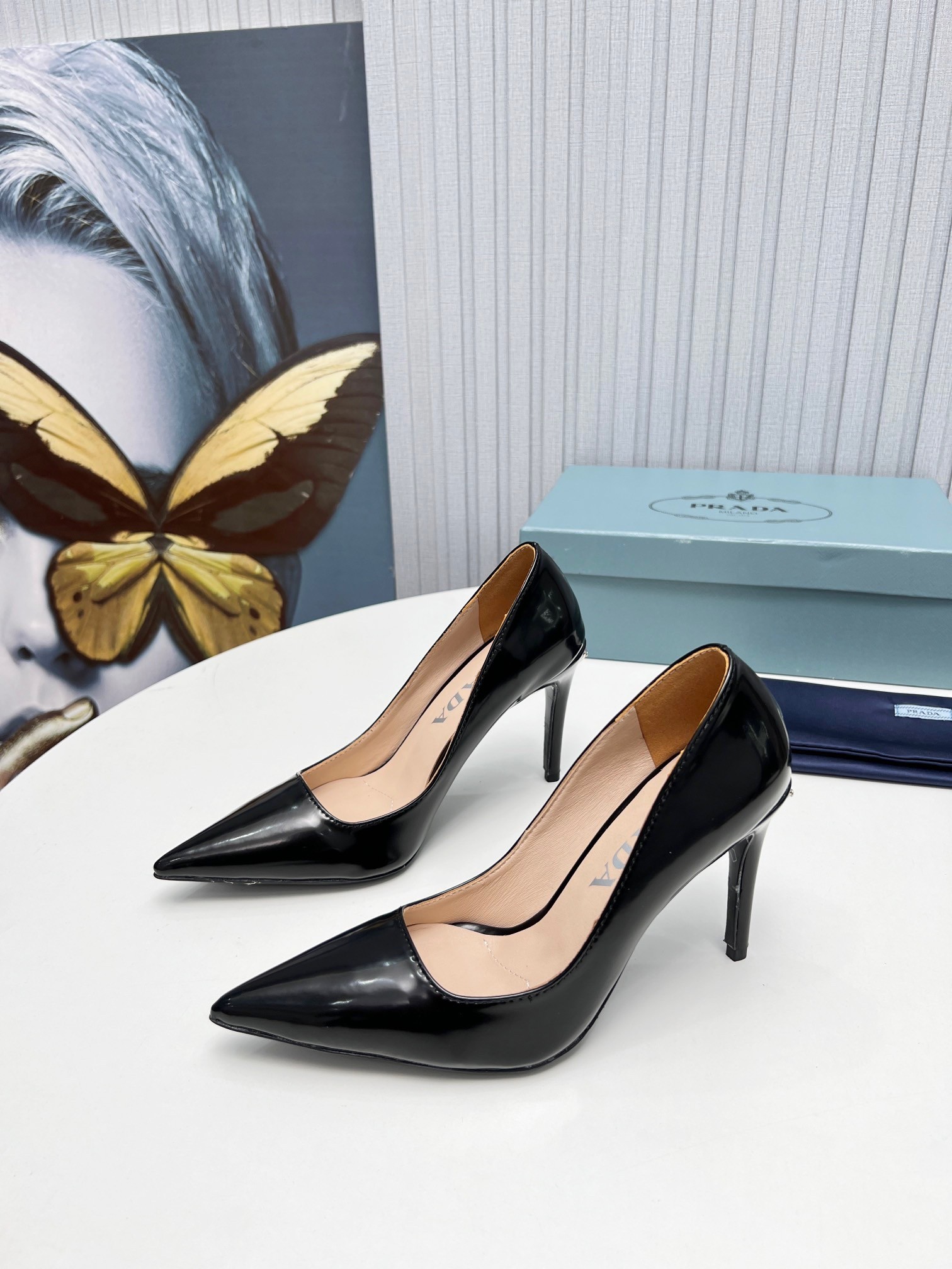 Pra*a pumps 95mm in black patent leather