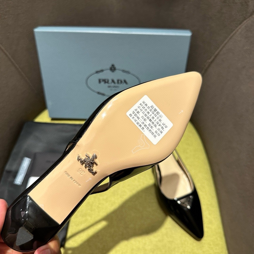 Pra*a slingback pumps 55mm in black patent leather
