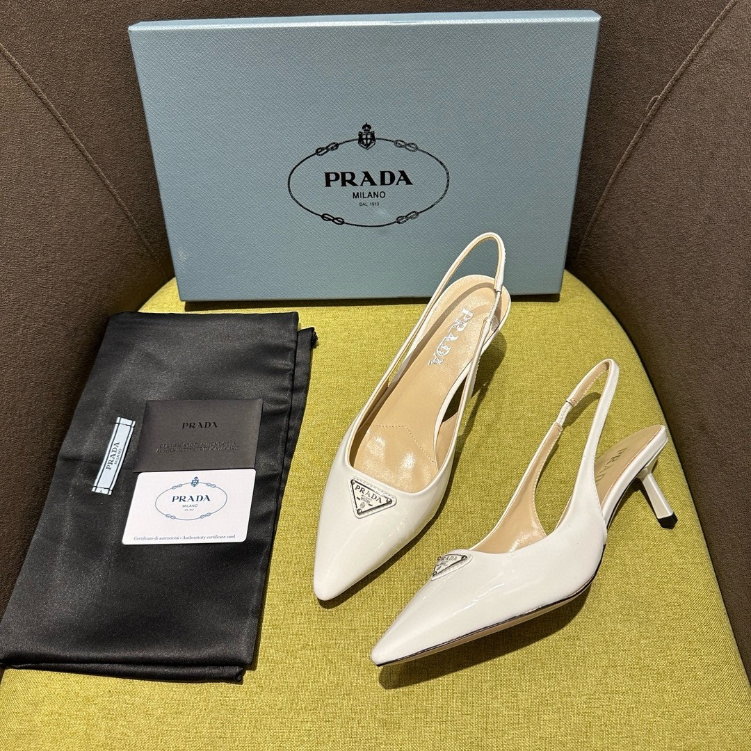 Pra*a slingback pumps 55mm in white patent leather