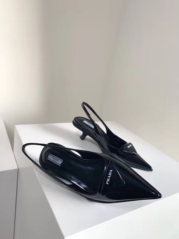 Pra*a slingback pumps in black brushed leather