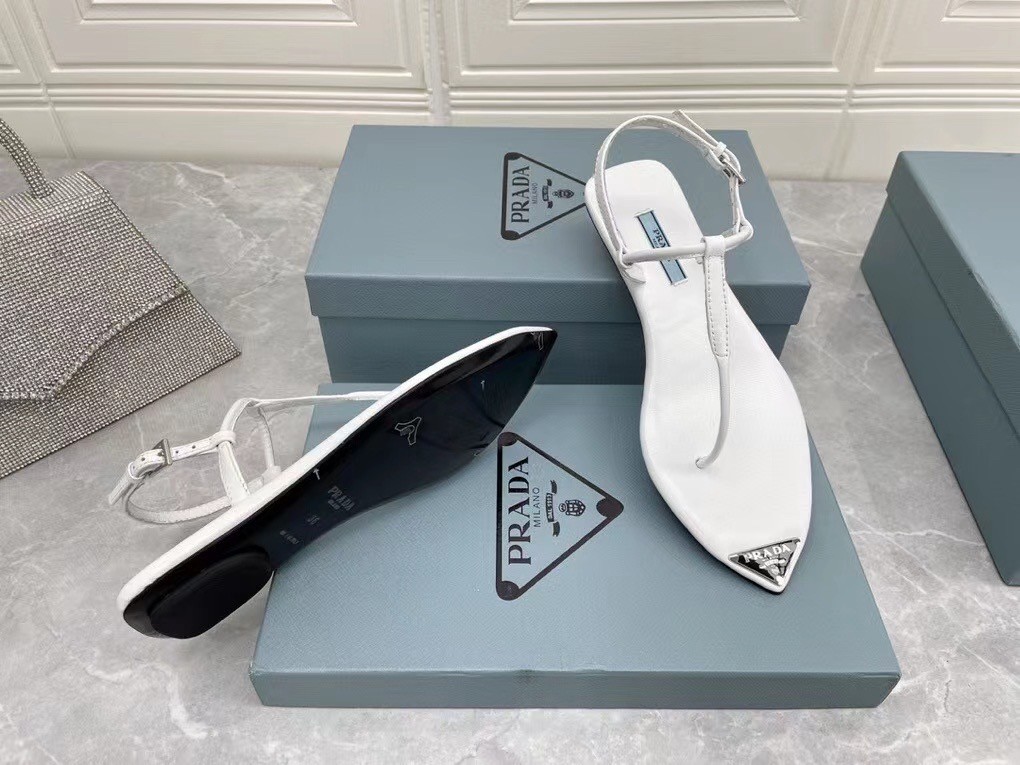 Pra*a thong sandals in white brushed leather
