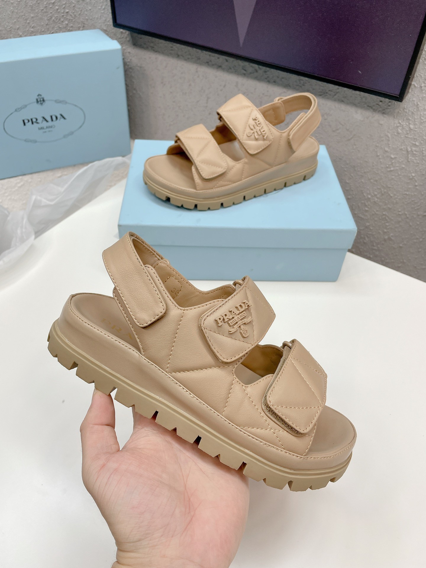Pra*a padded sandals in beige nappa leather