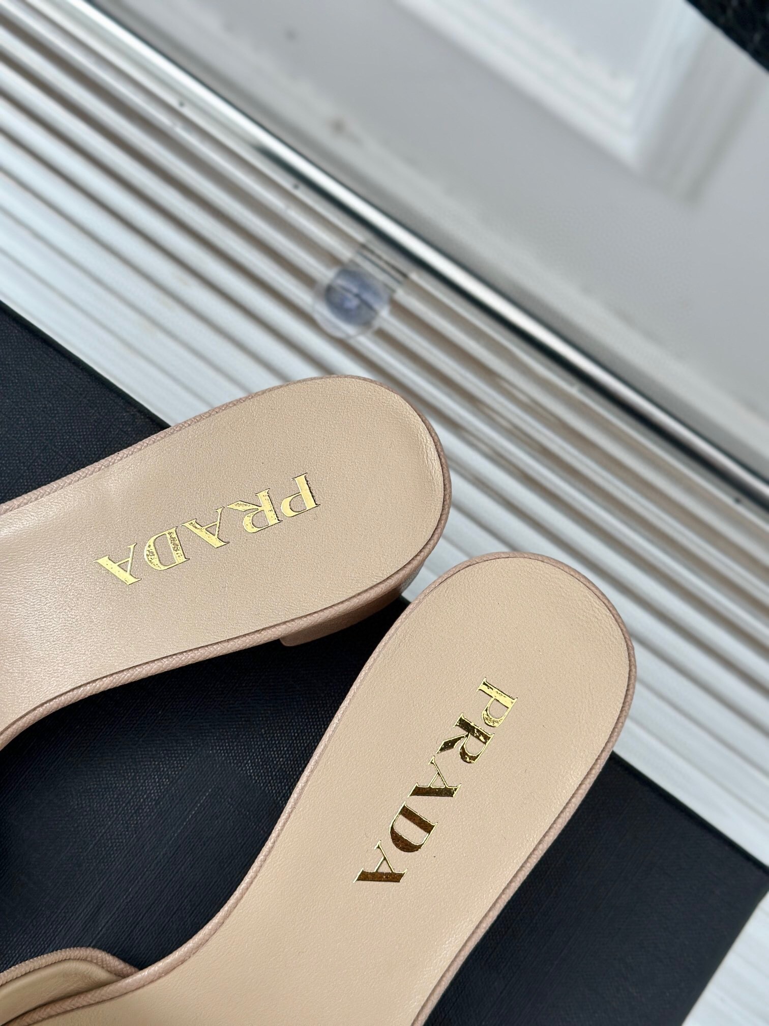 Pra*a heeled sandals 35mm in beige saffiano leather