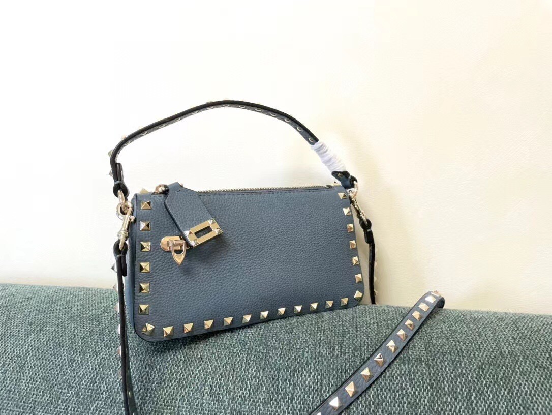 Va1e*ntin0 rockstud small crossbody bag in blue grained calfskin