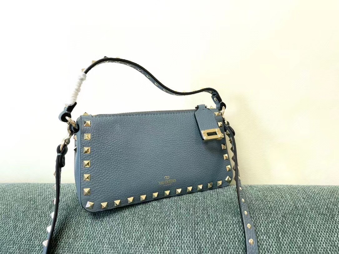 Va1e*ntin0 rockstud small crossbody bag in blue grained calfskin